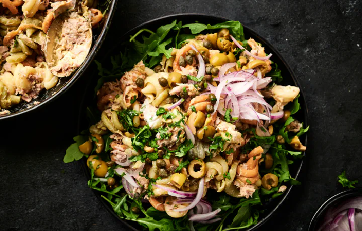 Featuring tender pasta, creamy Greek yogurt, Dijon mustard, and briny capers, this dish delivers a perfect mix of creamy and savory flavors.