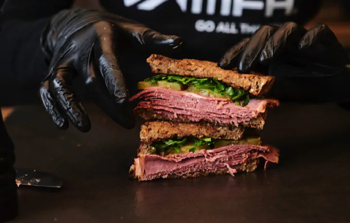 Indulge in a savory and tangy Pastrami & Arugula Sandwich that packs a punch! This easy-to-make sandwich features high-protein bread toasted to perfection.